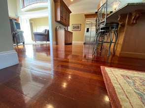Shiny wood floor entryway